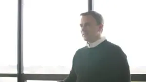 Callagy speaking to someone in his office